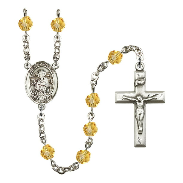 18-Inch Rhodium Plated Necklace with 6mm Topaz Birthstone Beads and Sterling Silver Saint Christina the Astonishing Charm. 